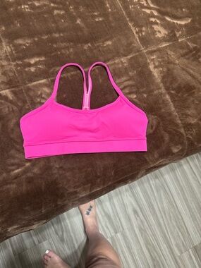 Woman’s size 6 Lululemon bright pink racerback sports bra